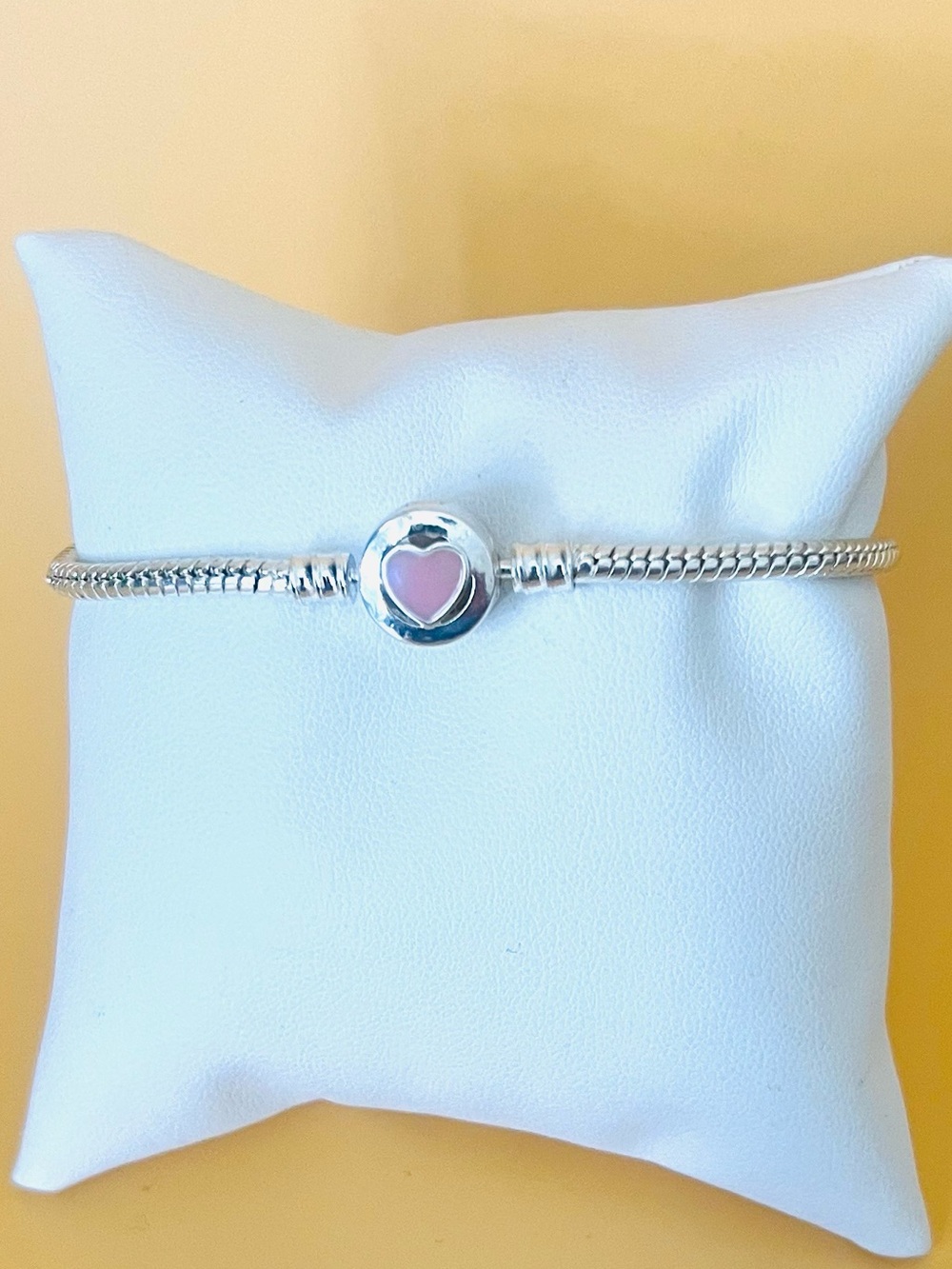 Silver plated bangle bracelet with enamel heart clasp